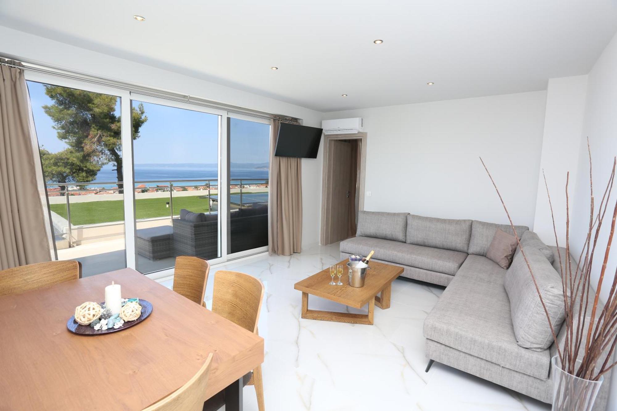 Alia Palace Hotel - Adults Only 16+ Chalkidiki Luaran gambar A living room